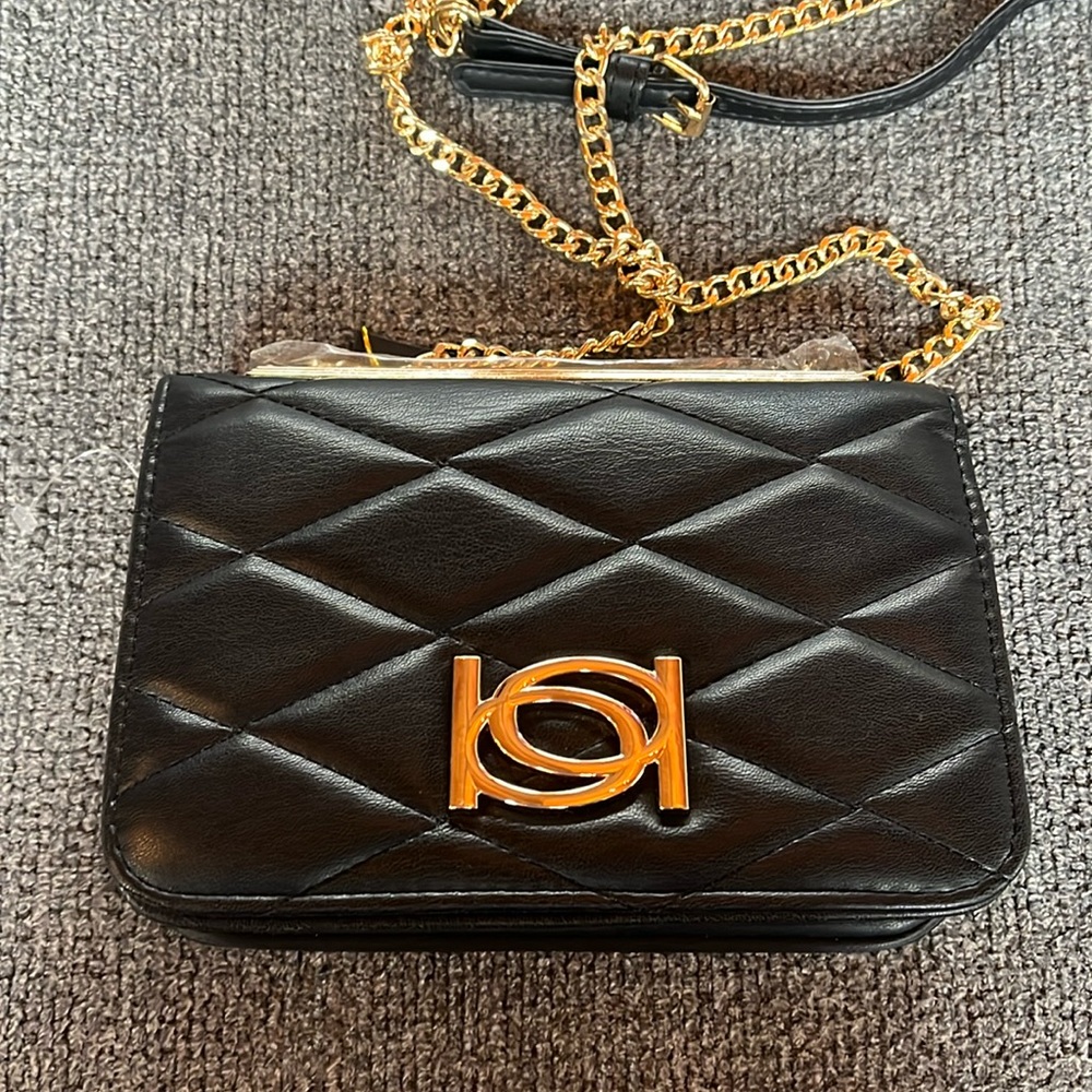 Crossbody black and gold Bebe purse nwt